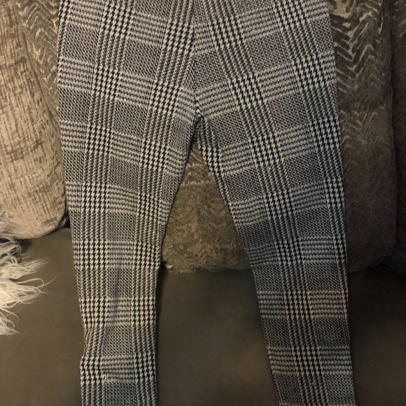 Black and white Checkered pants with zippers on the side of pants legs. - Picture 5 of 5